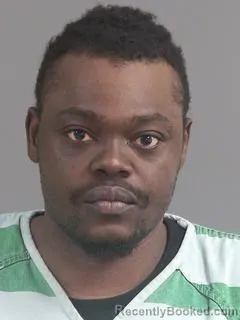 Mugshot of ALBERT LATHEL COAXUM