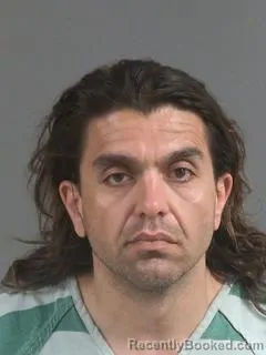 Mugshot of ALI BUKHATTALA booked in Charleston County, South Carolina on April 1, 2026