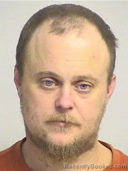 Mugshot of Alexander