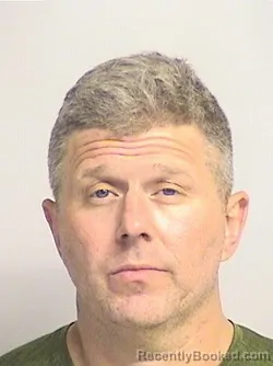 Mugshot of Hughes
