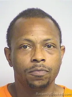 Mugshot of Henderson booked in Tuscaloosa County, Alabama on April 14, 2026