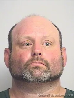 Mugshot of Hathcock booked in Tuscaloosa County, Alabama on July 4, 2026