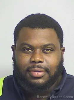 Mugshot of Monghan booked in Tuscaloosa County, Alabama on August 13, 2026