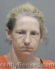 Mugshot of JULIE NICHOLE DEVILLE booked in Acadia County, Louisiana on May 20, 2026