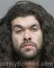 Mugshot of TYLER JASON MOUTON booked in Acadia County, Louisiana on May 21, 2026