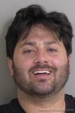 Mugshot of RYAN TYLOR DOMANGUE