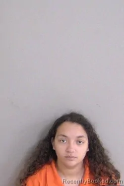 Mugshot of Sydney Georgiana Duplessis booked in Ascension County, Louisiana on April 21, 2026