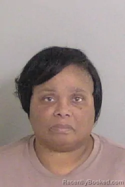 Mugshot of NICOLE WOODS booked in Ascension County, Louisiana on April 22, 2026