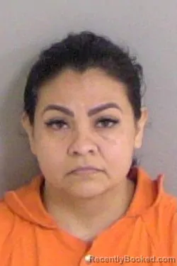 Mugshot of Maria Cristina Garcia booked in Ascension County, Louisiana on April 28, 2026