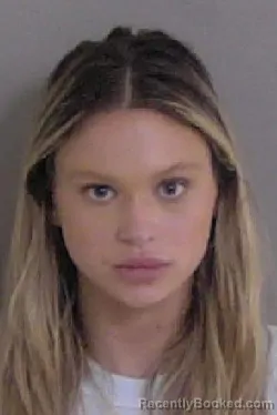 Mugshot of REGAN MARIE DAUZAT booked in Ascension County, Louisiana on June 9, 2026