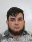 Mugshot of JOSH ADAM DOMANGUE