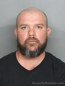 Mugshot of JOHN HENRY HORNBAKE