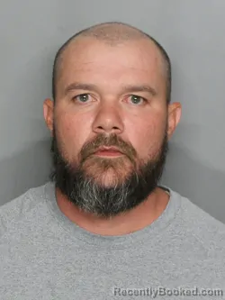 Mugshot of JOHN HENRY HORNBAKE