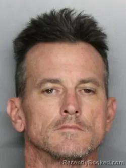 Mugshot of CHRISTOPHER MICHAEL LOMNICK