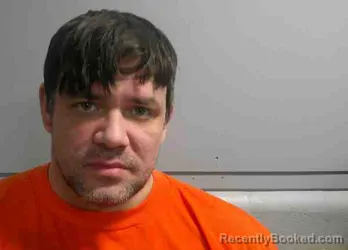 Mugshot of TRAVIS OWEN PUCKETT