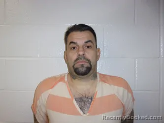 Mugshot of George Louis Escobar booked in Bossier County, Louisiana on October 12, 2026