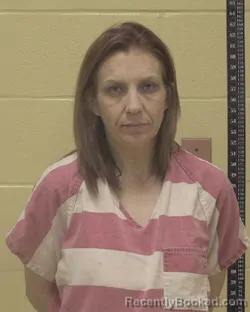 Mugshot of MELANIE ANN TUTTLE booked in Bossier County, Louisiana on July 13, 2026