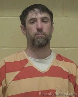 Mugshot of WESLEY BENJAMIN HUGHES