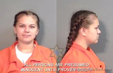 Mugshot of Ella Marjorie Mineau