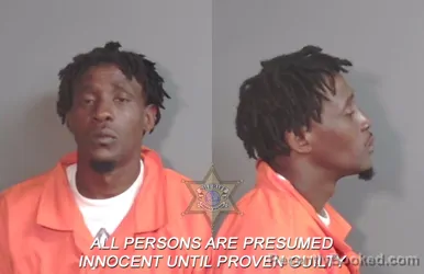 Mugshot of Dominique Xavier Sneed booked in Caddo County, Louisiana on March 14, 2026