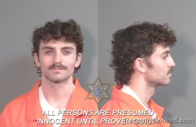 Mugshot of Mitchell Laton Leigh-manuell booked in Caddo County, Louisiana on March 21, 2026