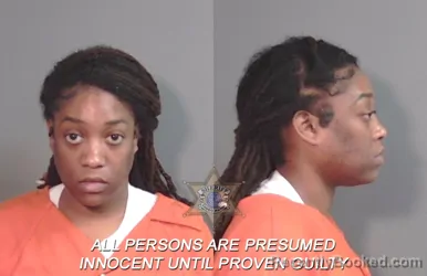 Mugshot of Megan Elizabeth Green booked in Caddo County, Louisiana on March 21, 2026