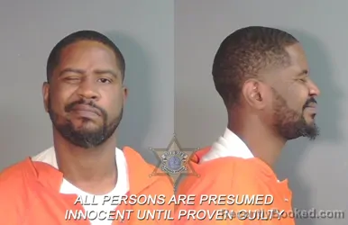 Mugshot of Christopher Dewon Kemp booked in Caddo County, Louisiana on March 31, 2026