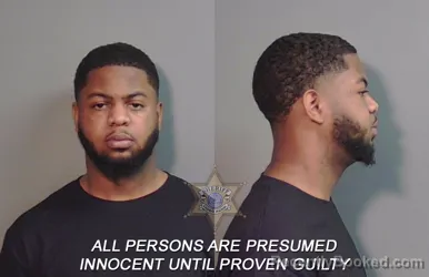 Mugshot of Christian Deon Fisher booked in Caddo County, Louisiana on April 1, 2026