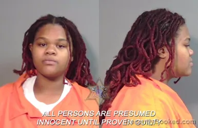 Mugshot of Jasmine Danielle Kelly booked in Caddo County, Louisiana on April 1, 2026