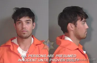 Mugshot of Ashten John Pekelo Wong booked in Caddo County, Louisiana on April 26, 2026