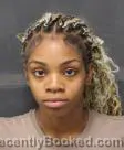 Mugshot of Adrionna Coleman booked in East Baton Rouge County, Louisiana on August 31, 2026