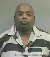 Mugshot of SHANNON D SIMIEN