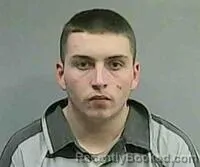 Mugshot of TIMOTHY J BASSINGER