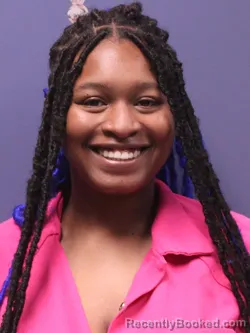 Mugshot of ANJANIQUE JARIE HENDERSON booked in Iberville County, Louisiana on April 15, 2026