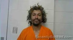 Mugshot of EFRAIN J MIRANDA