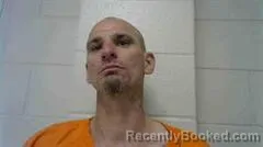 Mugshot of JUSTIN W CLEMENT