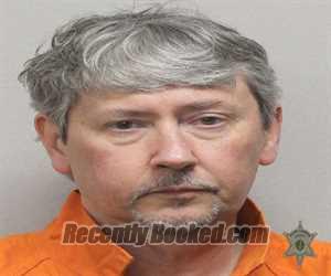 Booking photo from Lafayette Parrish, Louisiana