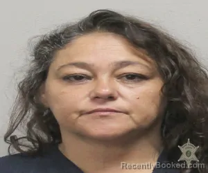 Mugshot of JULIE HASSANSONNIER