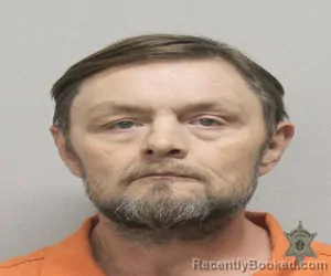 Mugshot of BRYAN BERCHMAN CARRIERE