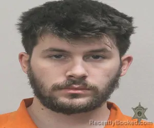 Mugshot of DONTAY LEE SINITIERE