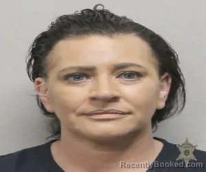 Mugshot of LEANNE M BOST booked in Lafayette County, Louisiana on March 7, 2026