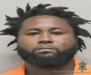 Mugshot of DEMONTRE ROBERTSON booked in Lafayette County, Louisiana on March 8, 2026