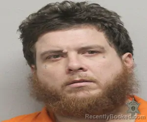 Mugshot of JEREMY M ROMERO booked in Lafayette County, Louisiana on March 10, 2026