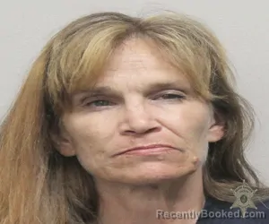 Mugshot of LYSIANE CAROLYN CORMIER booked in Lafayette County, Louisiana on March 11, 2026