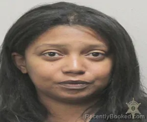 Mugshot of ALIVIA MARIE DEROUEN booked in Lafayette County, Louisiana on March 11, 2026