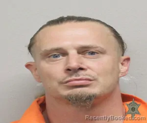 Mugshot of TAVID LEE NORMAN booked in Lafayette County, Louisiana on March 12, 2026