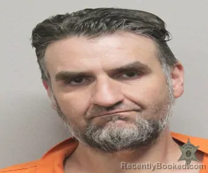 Mugshot of JUSTUS NATHANIEL MECHE booked in Lafayette County, Louisiana on March 12, 2026