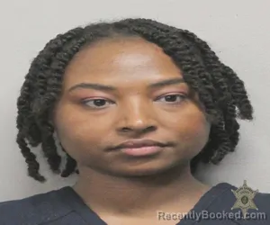 Mugshot of CYNTHIA GREEN booked in Lafayette County, Louisiana on March 12, 2026