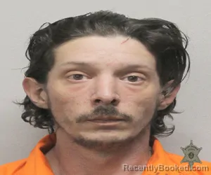 Mugshot of DEREK J DEVALCOURT booked in Lafayette County, Louisiana on March 12, 2026