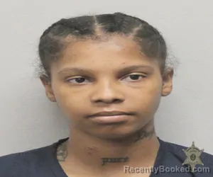 Mugshot of DEVIANIA LIPSCOMB booked in Lafayette County, Louisiana on March 13, 2026